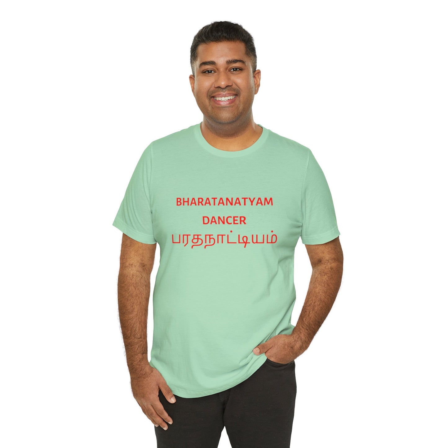 a man wearing a mint shirt that says bharatanatyam dancer with bharatanatyam written in Tamil