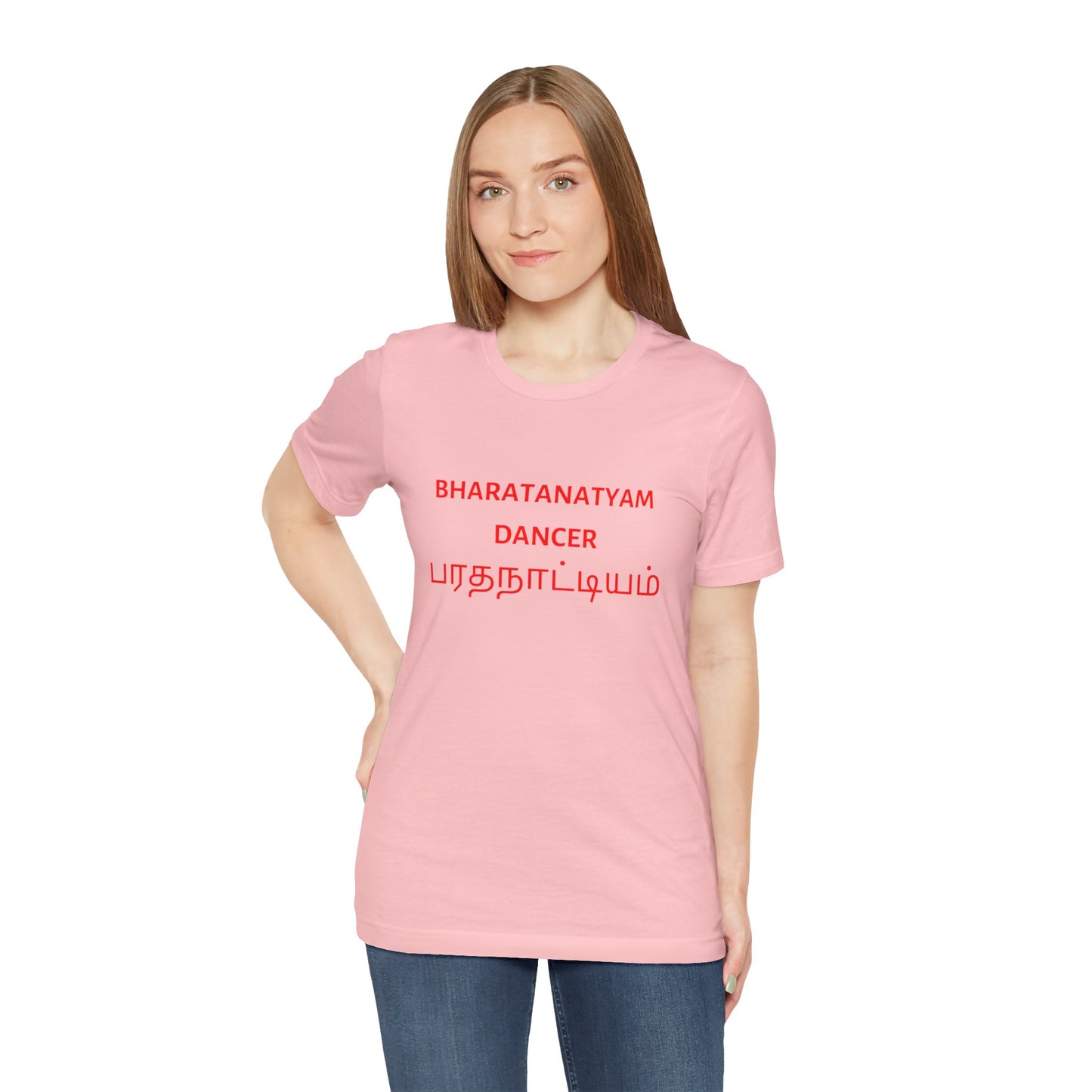 a woman wearing a pink shirt that says bharatanatyam dancer with bharatanatyam written in Tamil