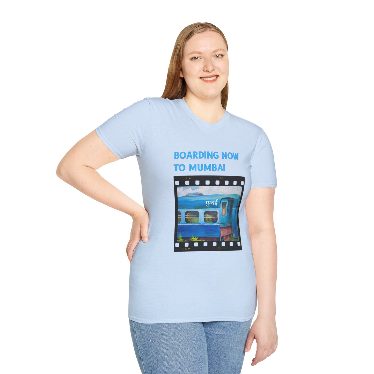 a woman wearing a light blue shirt that says boarding now to mumbai with a graphic of a train