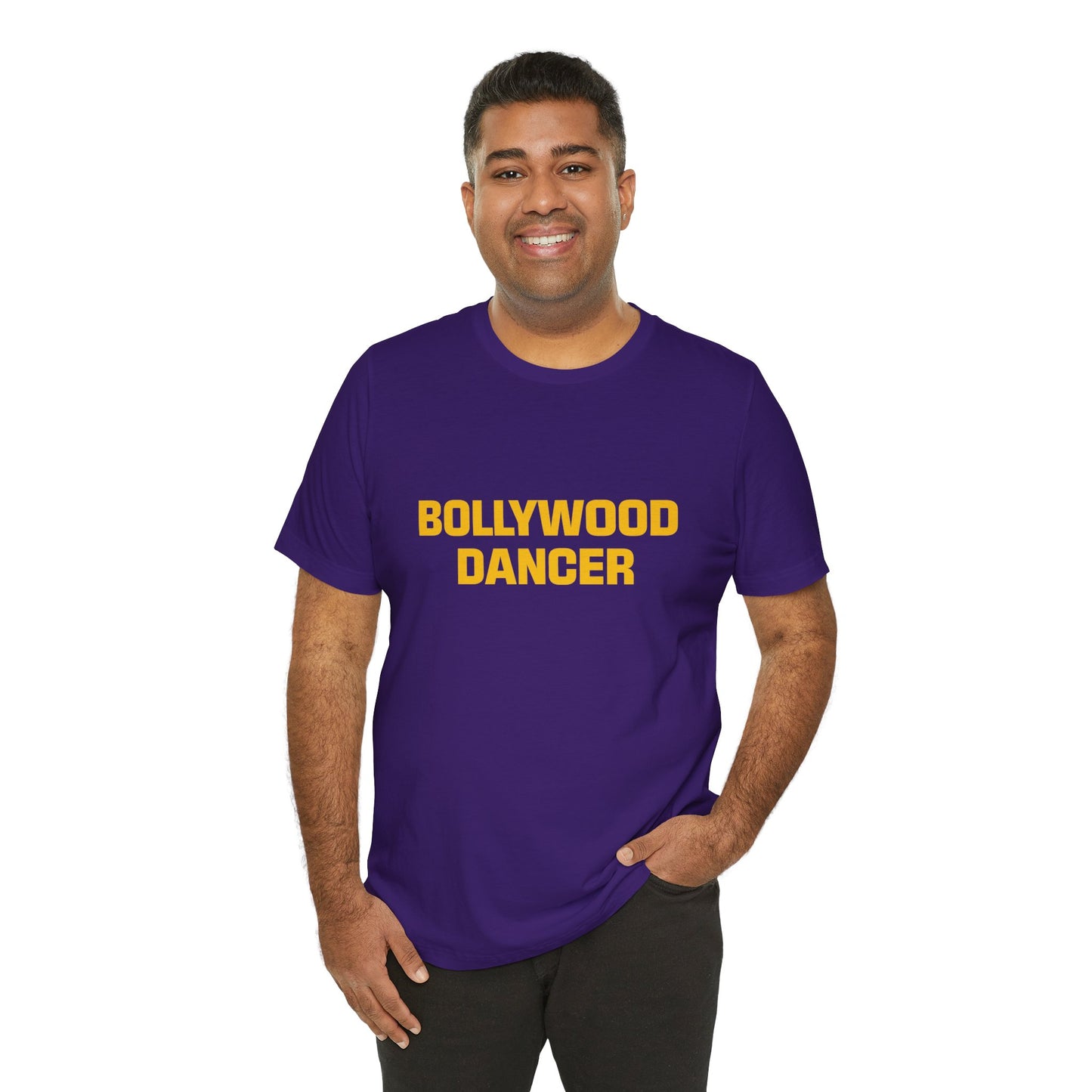 man wearing a team purple shirt that says Bollywood Dancer