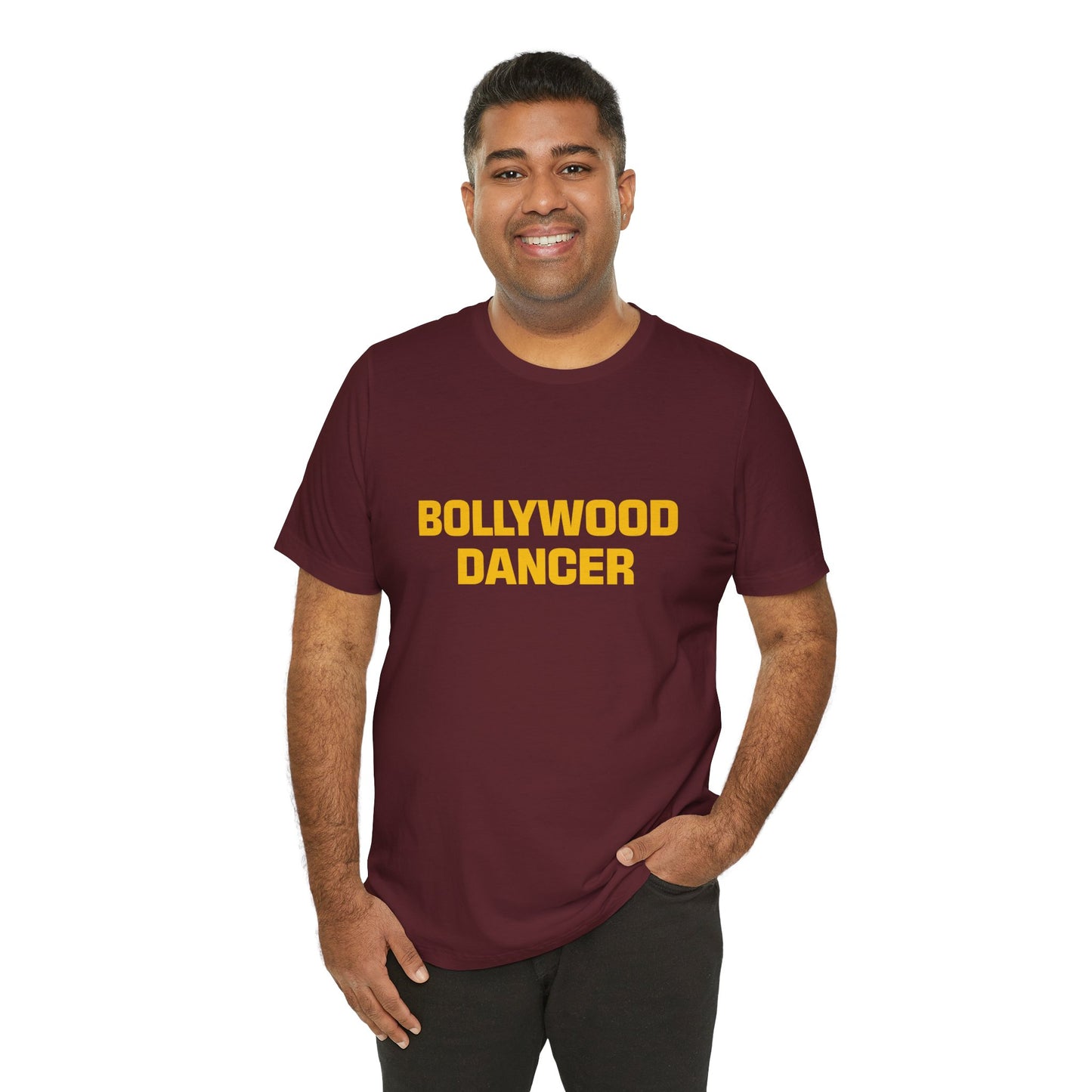 a man wearing a maroon shirt that says bollywood dancer