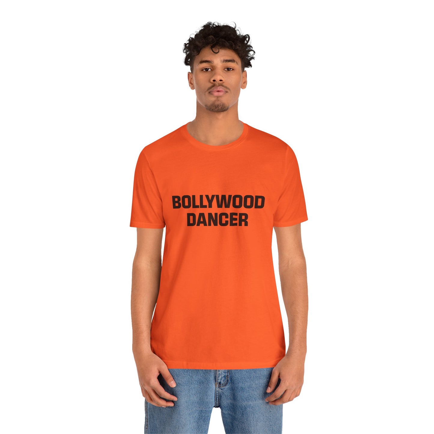 a man wearing a orange shirt that says bollywood dancer