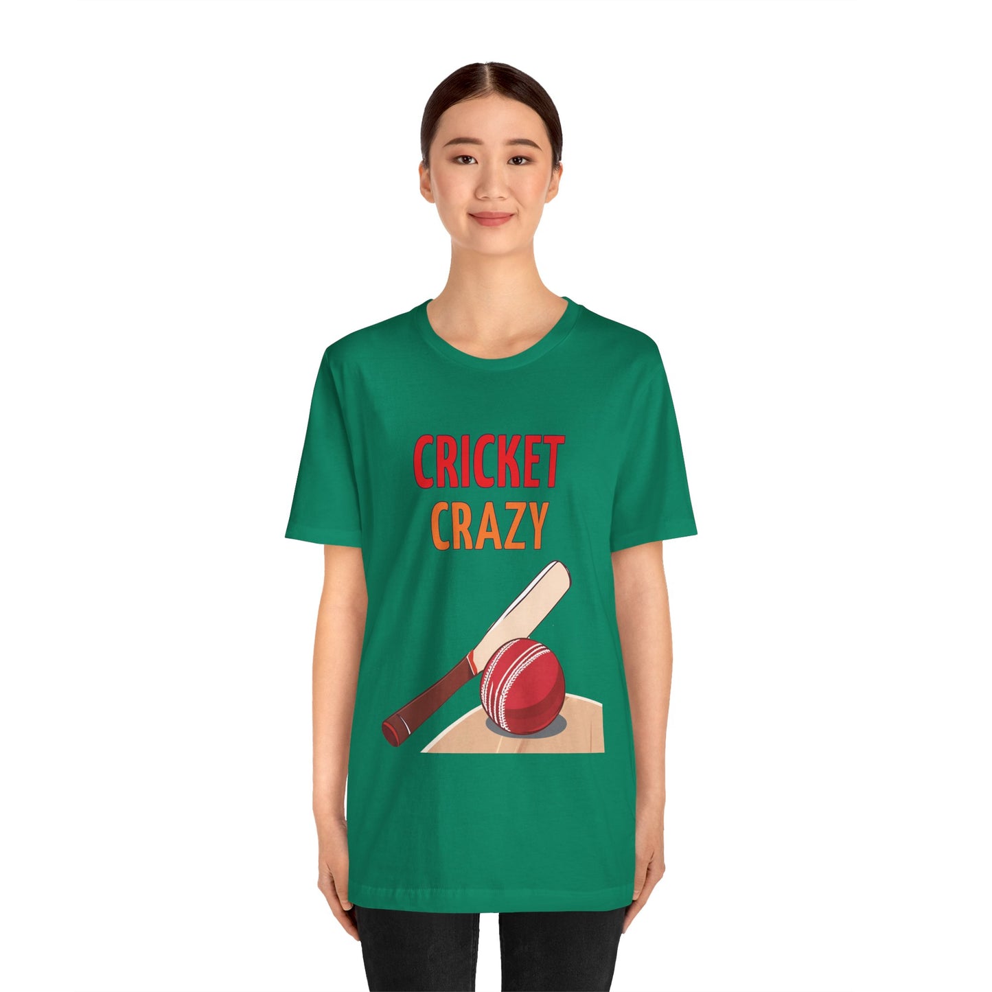 a woman wearing a kelly green shirt that says cricket crazy with a graphic of a cricket bat and ball