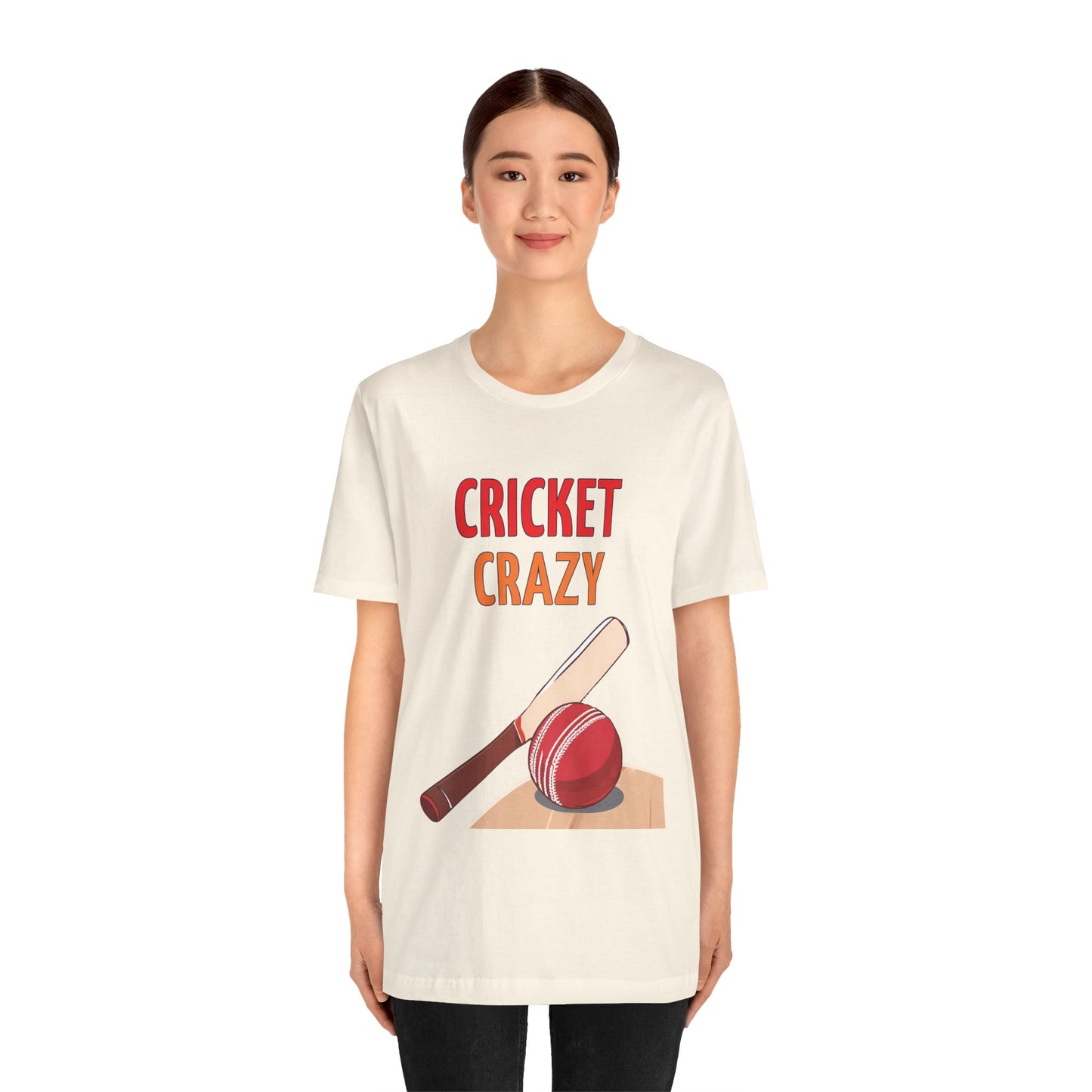 a woman wearing a natural shirt that says cricket crazy with a graphic of a cricket bat and ball