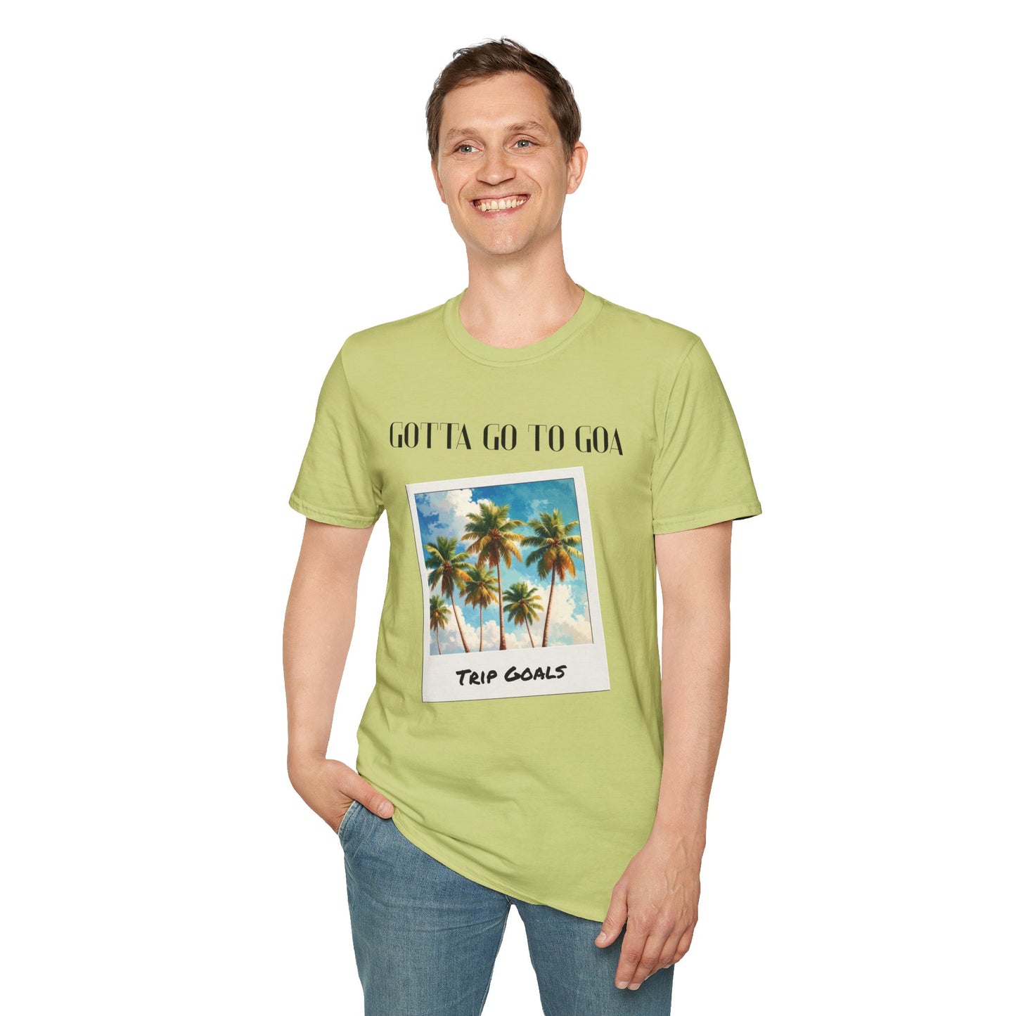 a man wearing a pistachio shirt that says gotta go to goa with a graphic of goa beach as a postcard that says trip goals