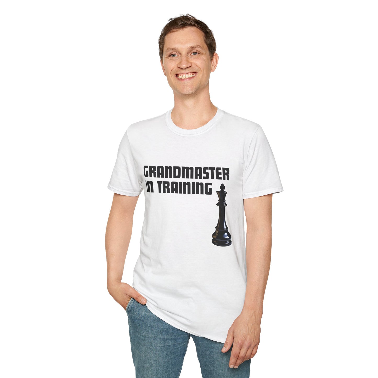 a man wearing a white shirt that says Grandmaster in Training with a King chess piece