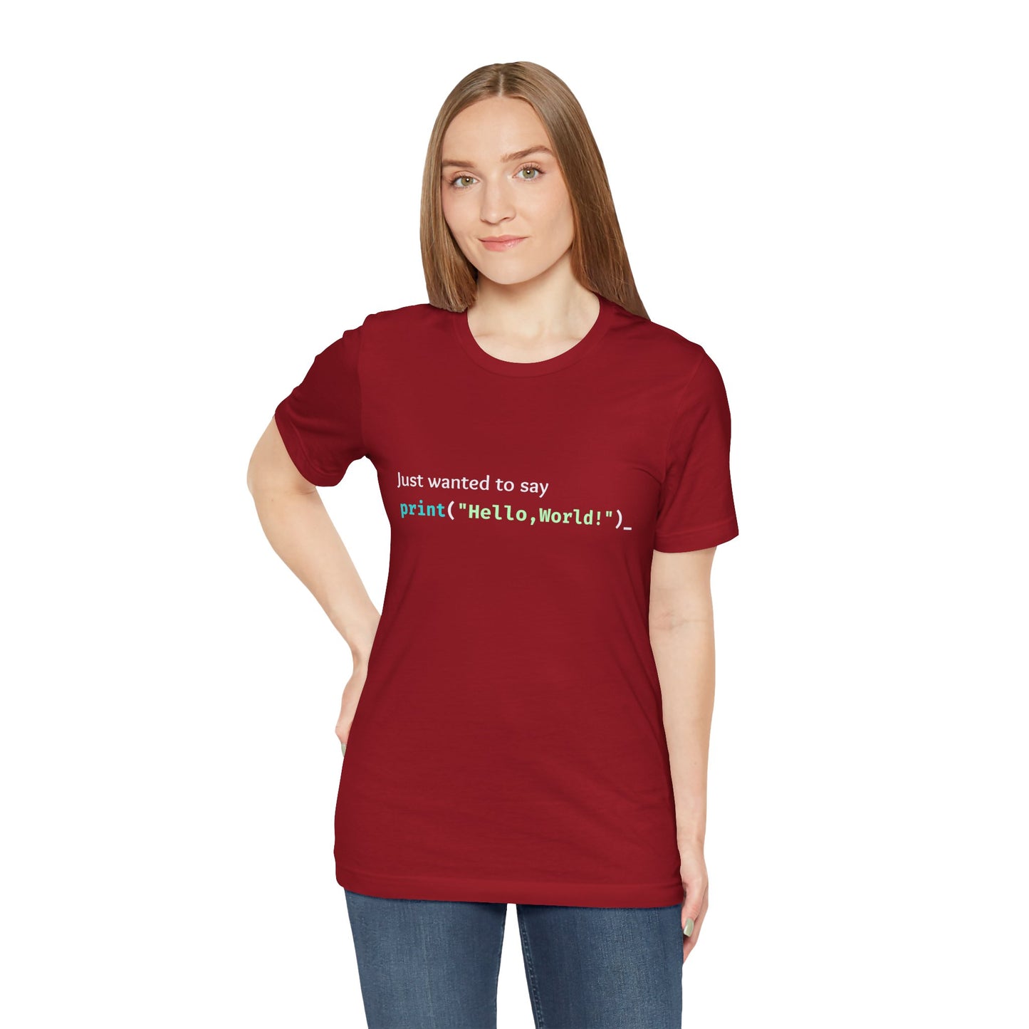 a woman wearing a canvas red shirt that says just wanted to say with hello world written in programming language