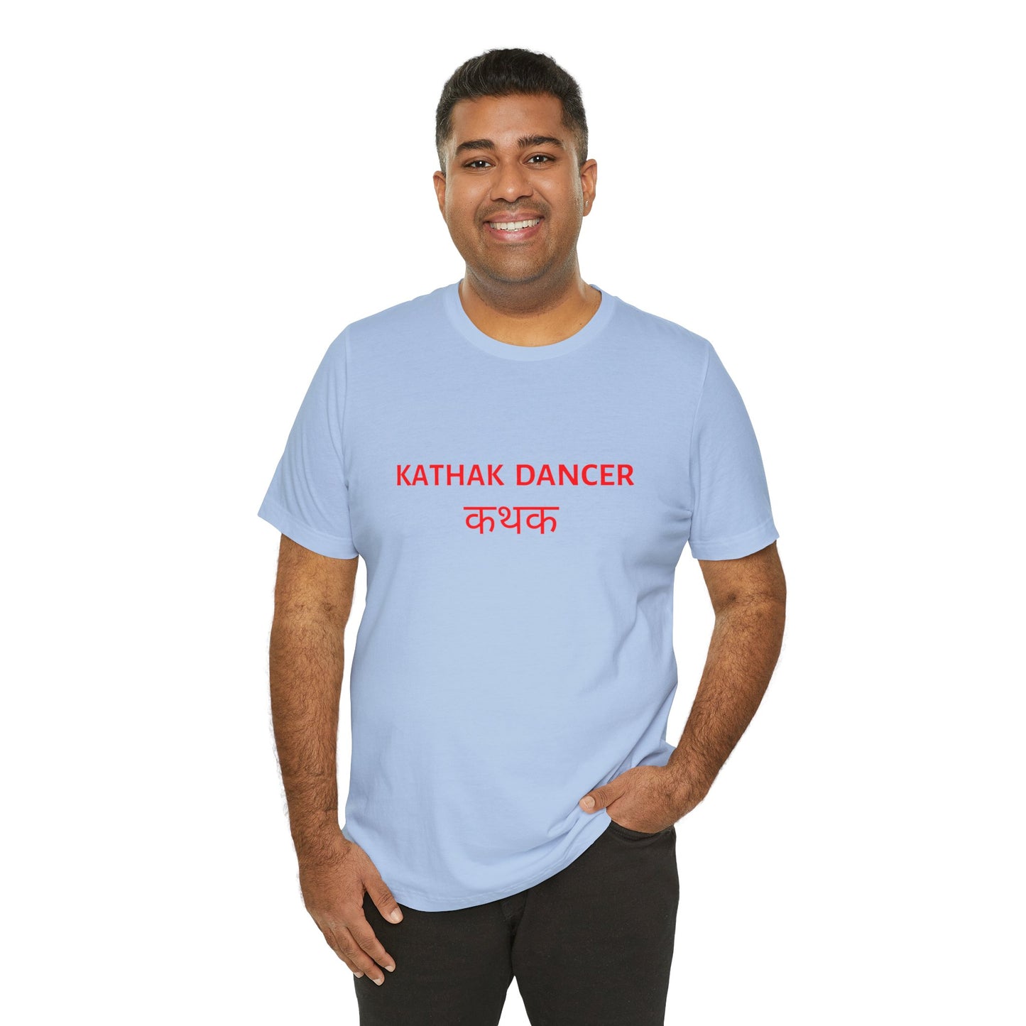 a man wearing a baby blue shirt that says kathak dancer