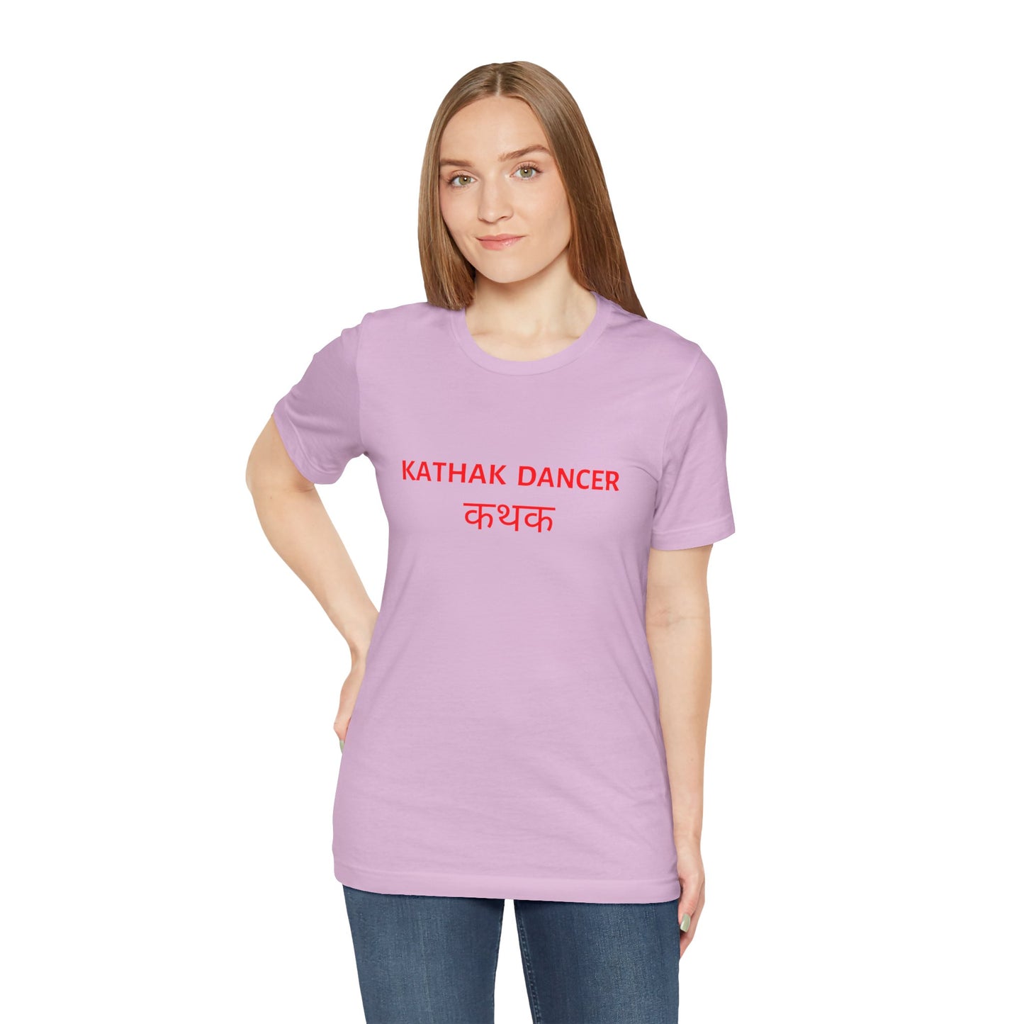 a woman wearing a lilac shirt that says kathak dancer