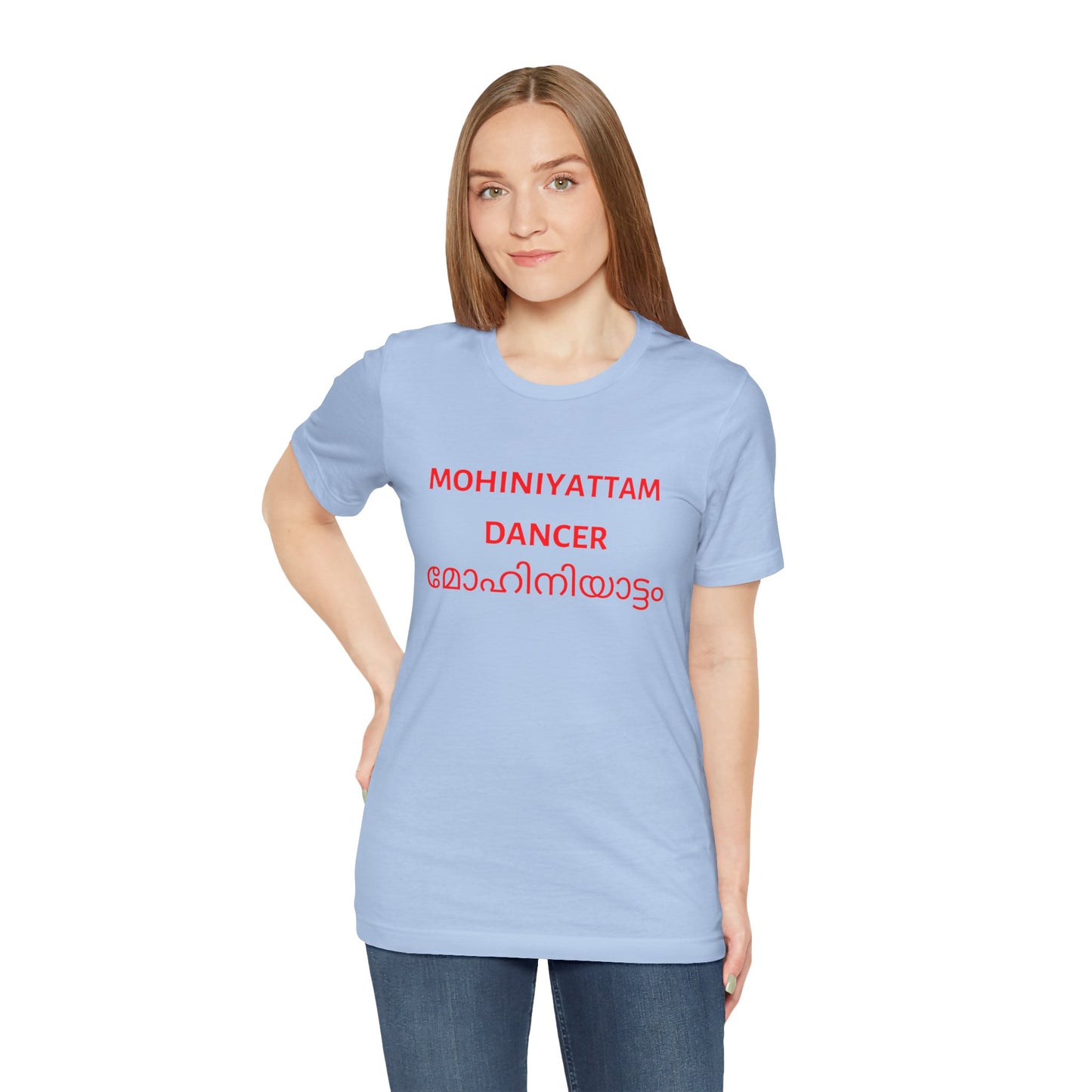 a woman wearing a baby blue shirt that says Mohiniyattam dancer with Mohiniyattam also written in Malayalam