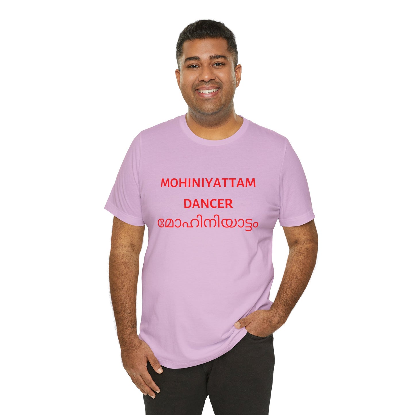 a man wearing a lilac shirt that says Mohiniyattam dancer with Mohiniyattam also written in Malayalam