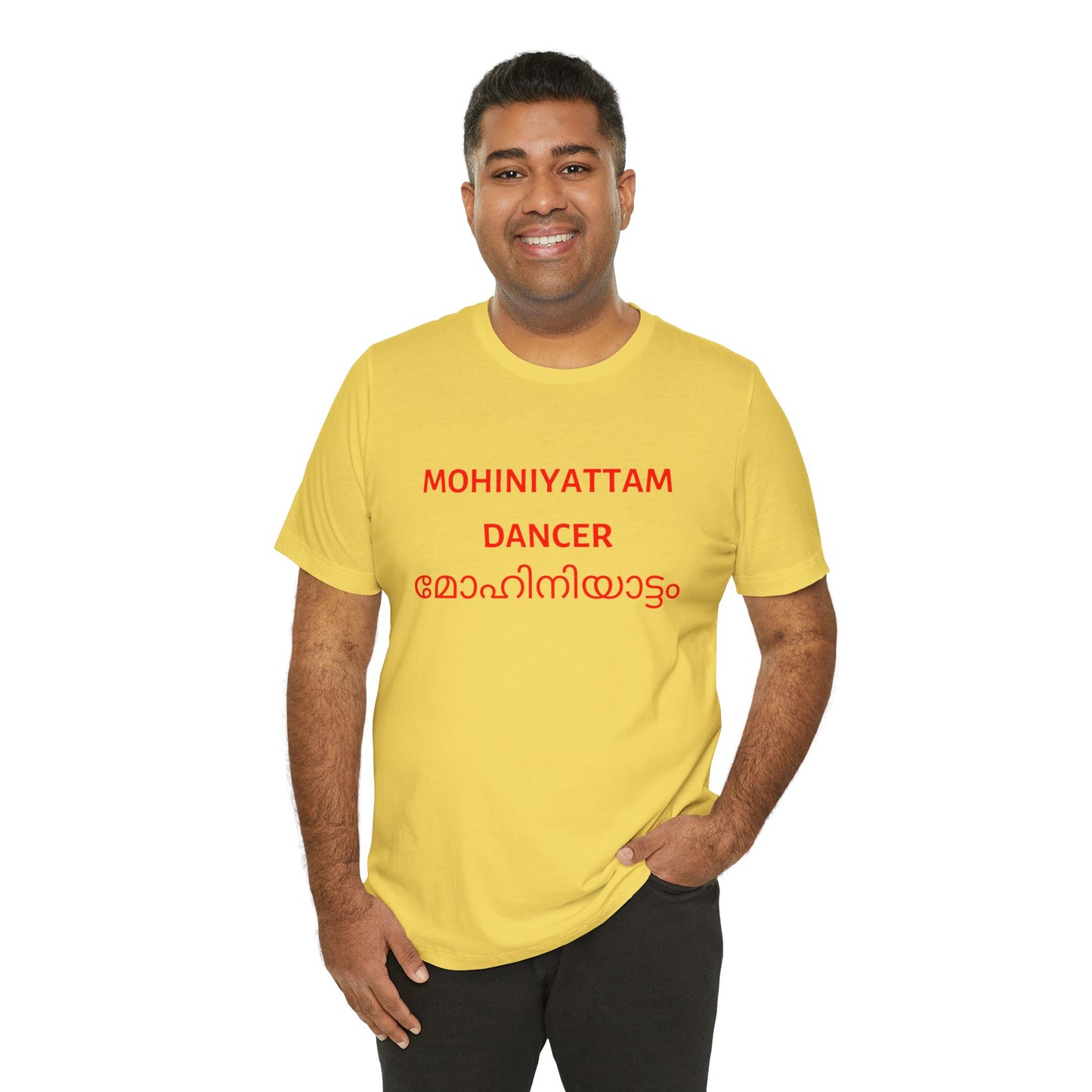 a man wearing a maize yellow shirt that says Mohiniyattam dancer with Mohiniyattam also written in Malayalam
