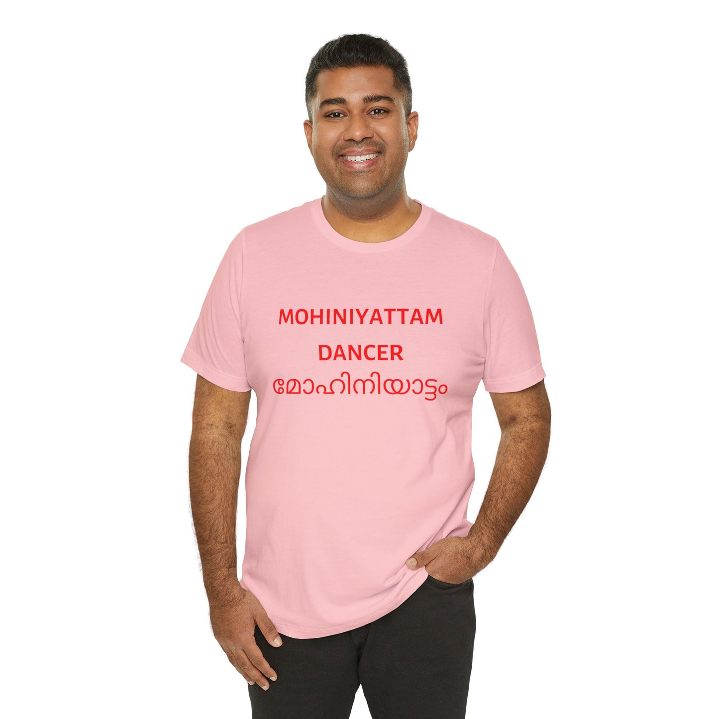 a man wearing a pink shirt that says Mohiniyattam dancer with Mohiniyattam also written in Malayalam