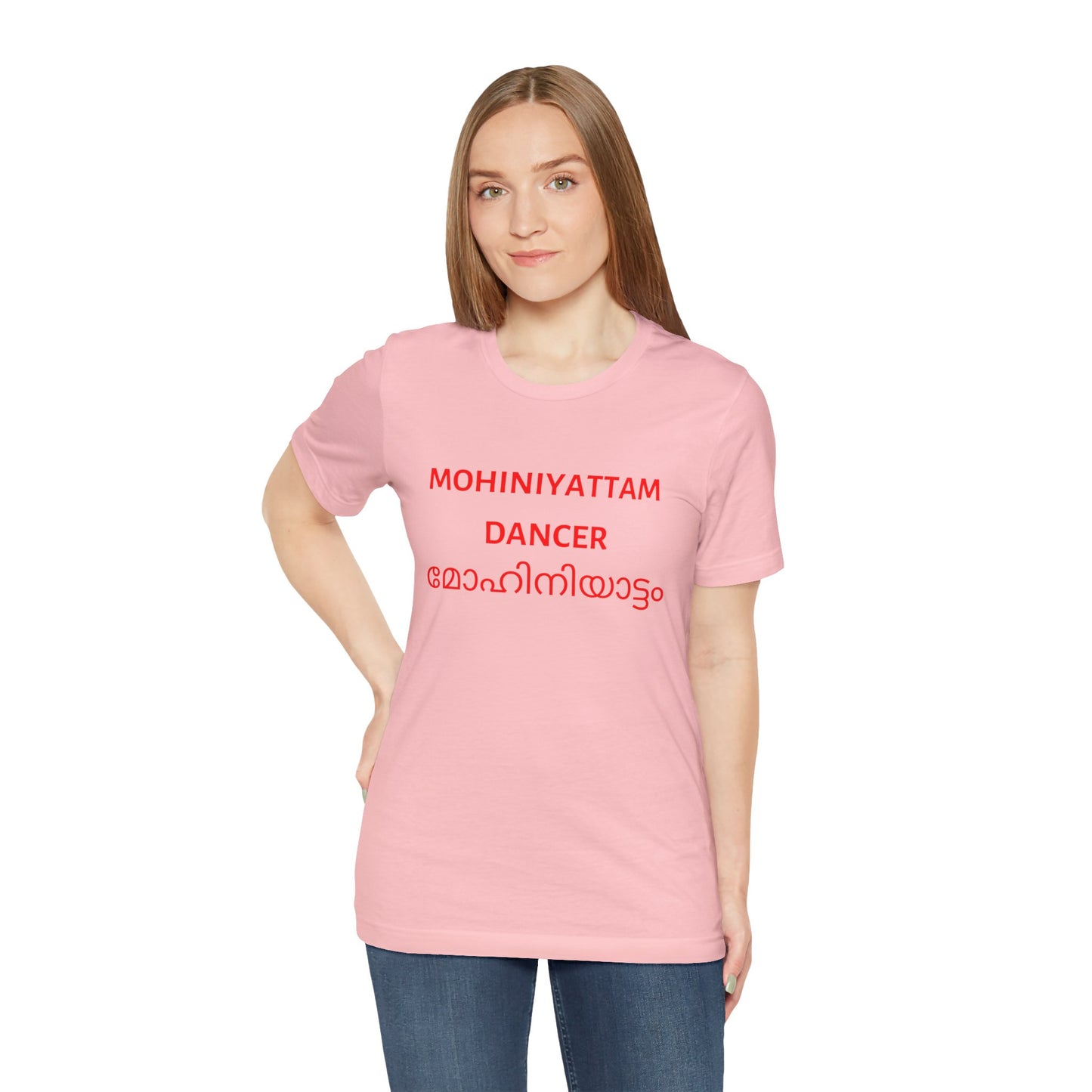 a woman wearing a pink shirt that says Mohiniyattam dancer with Mohiniyattam also written in Malayalam