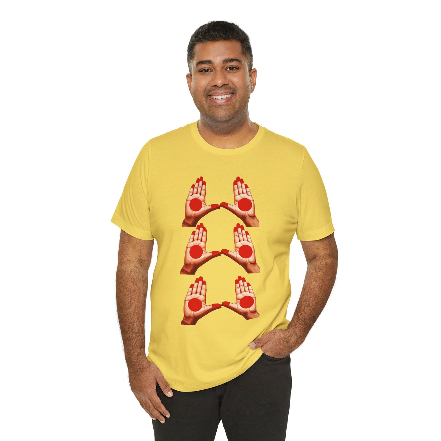 a man wearing a maize yellow shirt that shows mudras