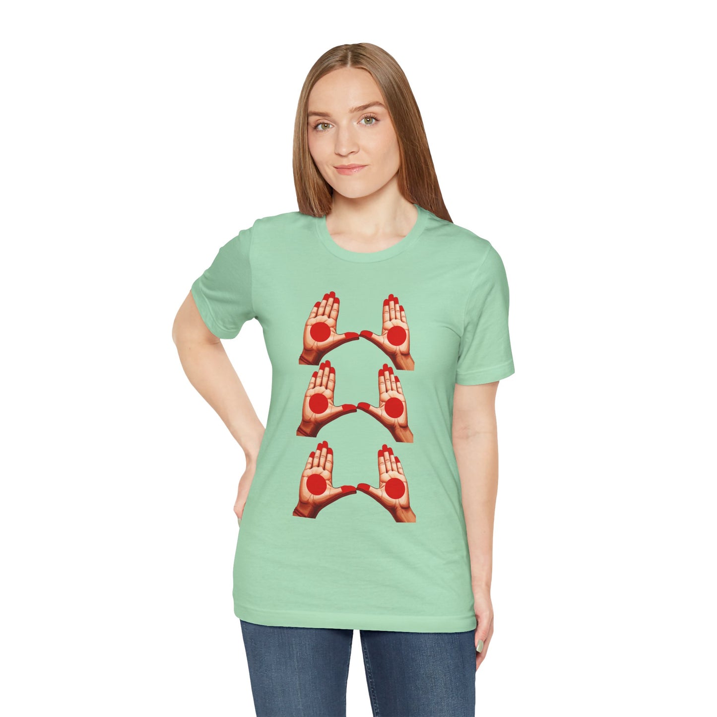 a woman wearing a mint shirt that shows mudras