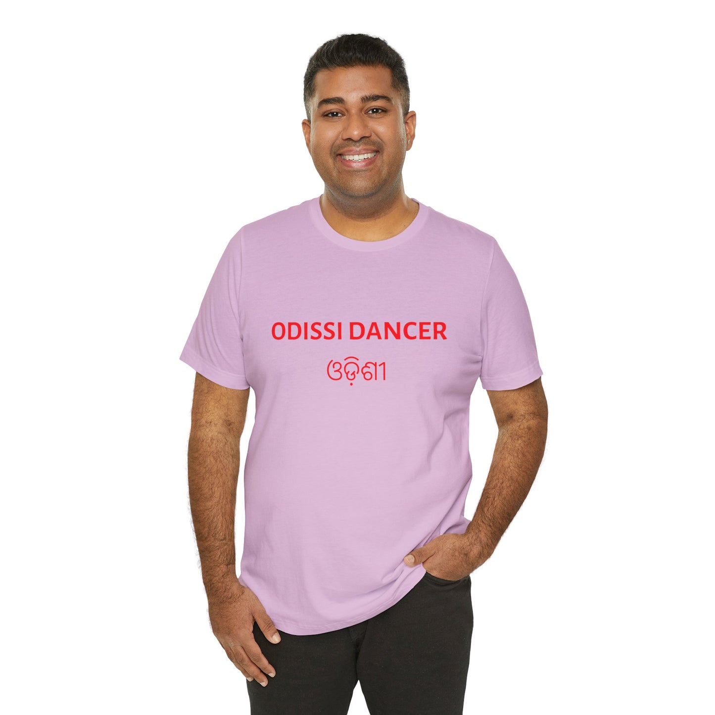 a man wearing a lilac shirt that says Odissi dancer with Odissi also written in Odia