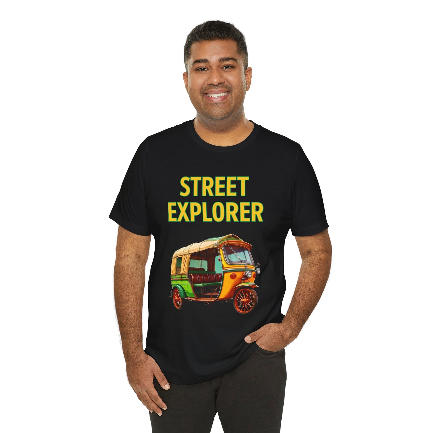 a man wearing a black shirt that says street explorer with a graphic of an auto rickshaw