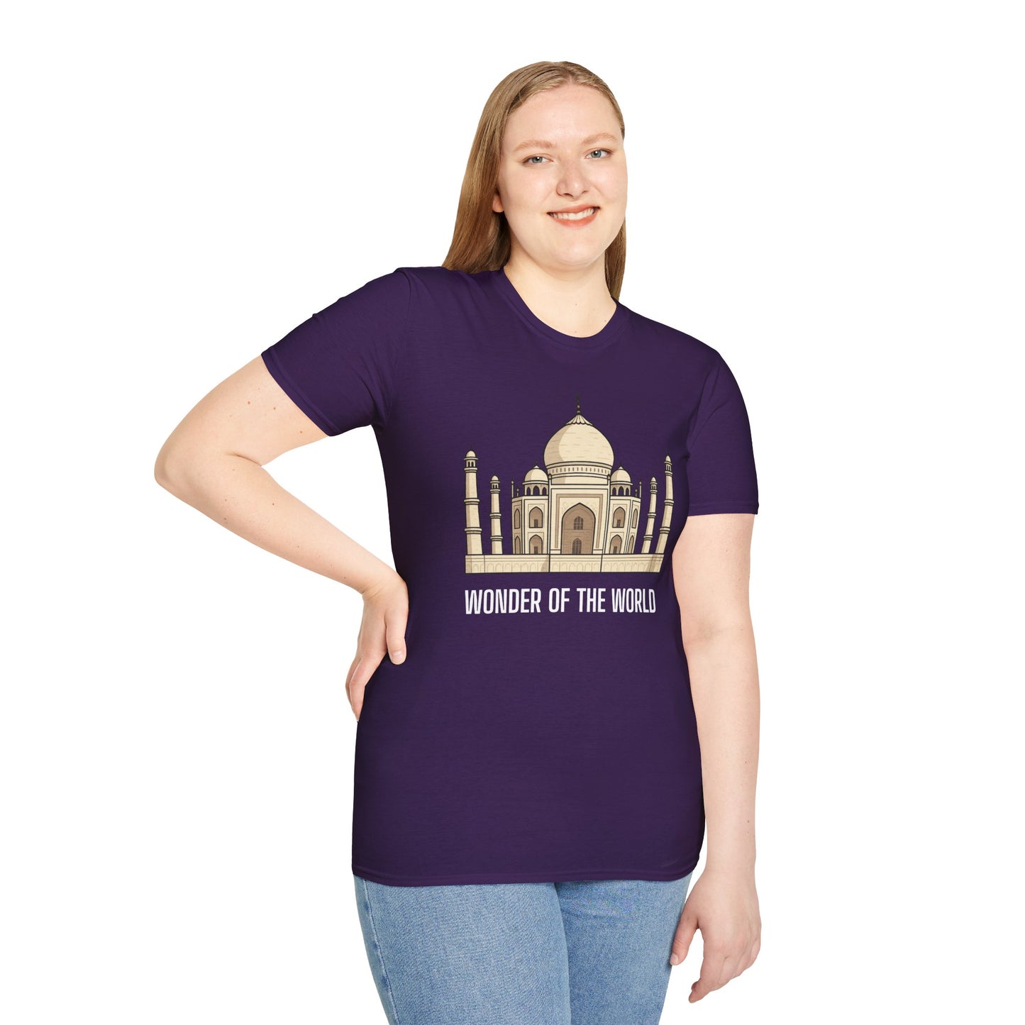 a woman wearing a purple shirt that says wonder of the world with a graphic of the taj mahal