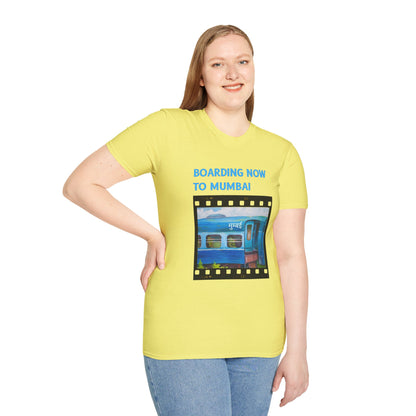 a woman wearing a cornsilk yellow shirt that says boarding now to mumbai with a graphic of a train