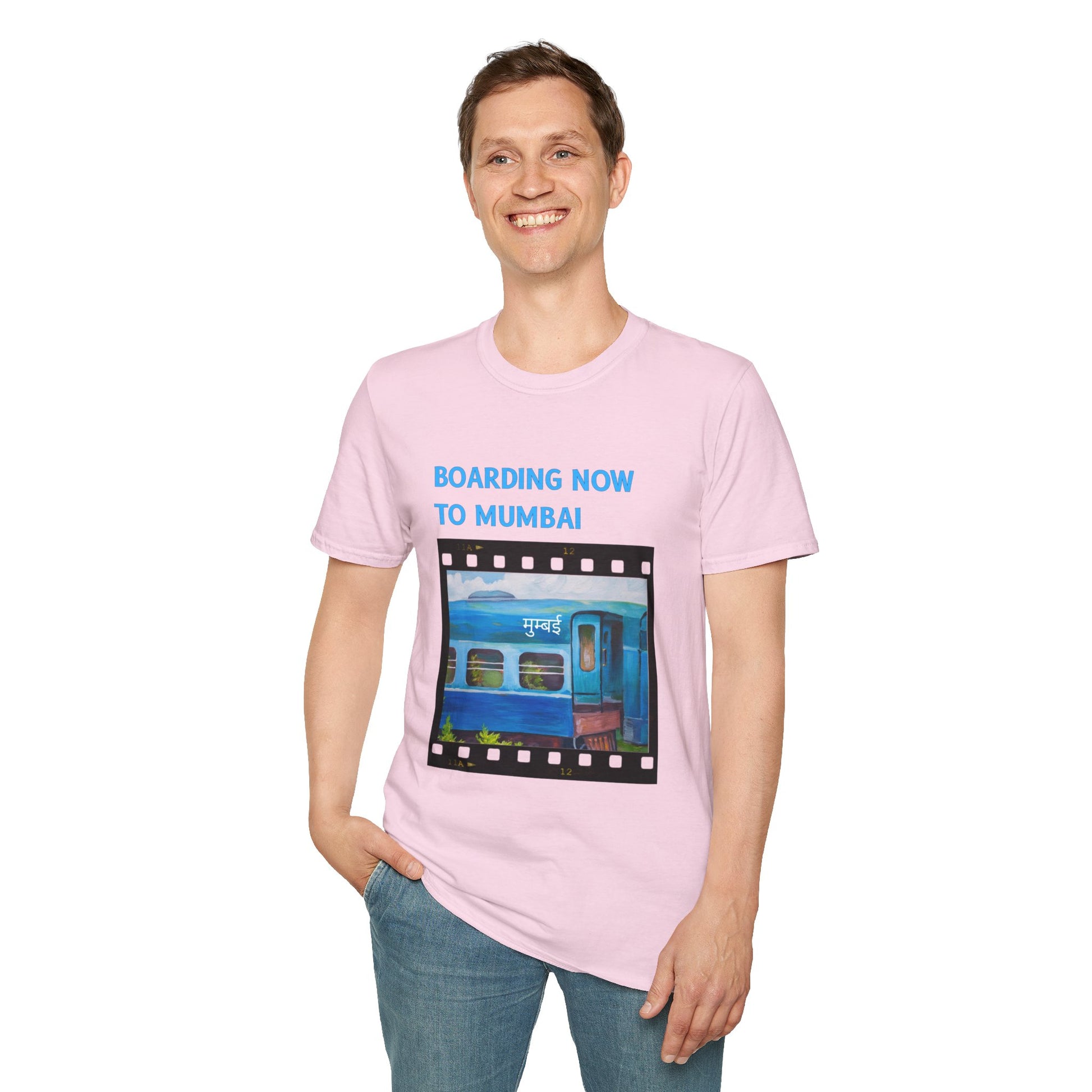 a man wearing a light pink shirt that says boarding now to mumbai with a graphic of a train
