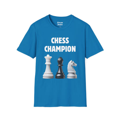 a sapphire blue shirt that says chess champion with a graphic of a Queen piece next to a Bishop piece next to a Knight piece