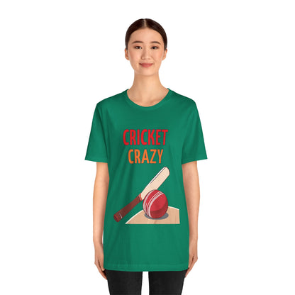 a woman wearing a kelly green shirt that says cricket crazy with a graphic of a cricket bat and ball