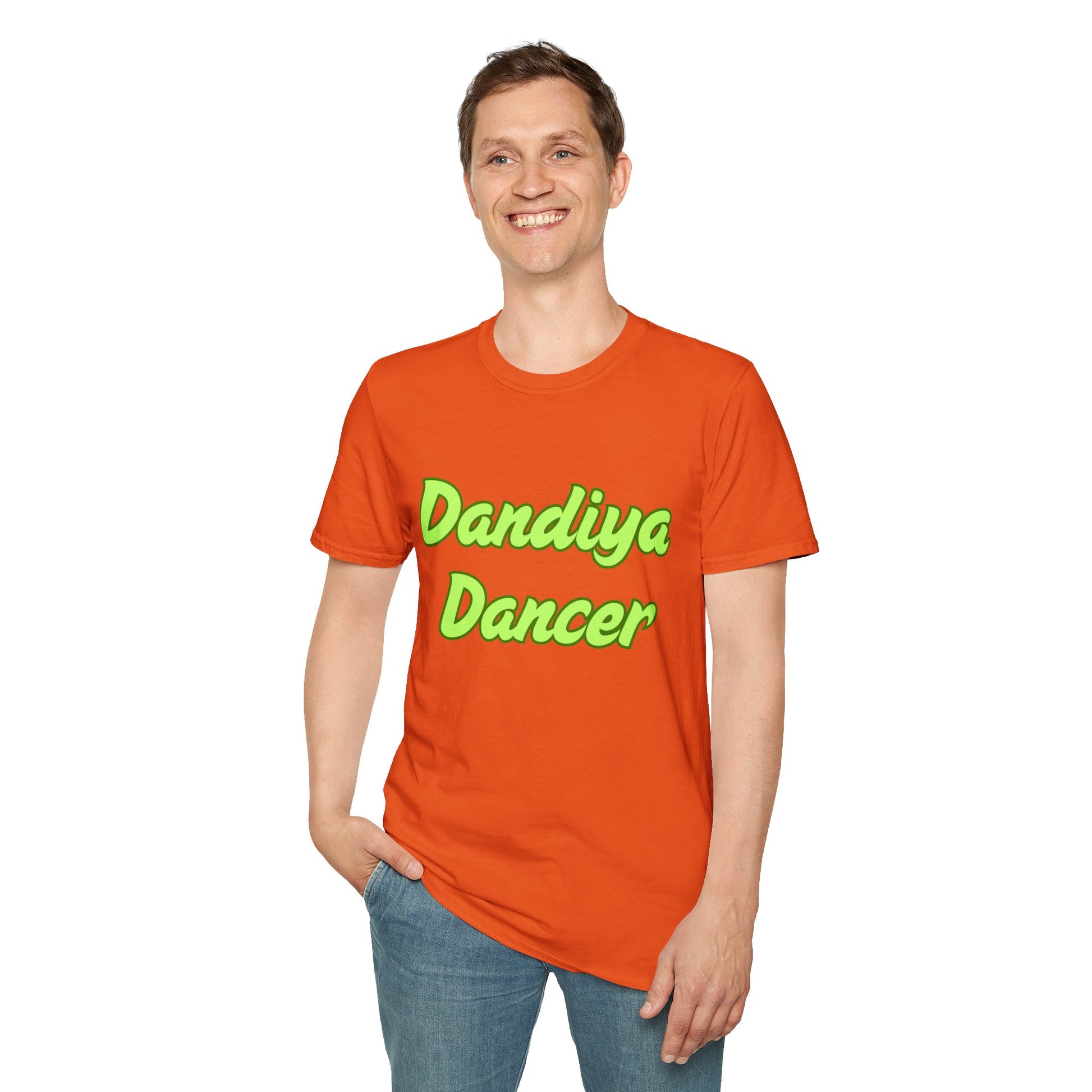 a man wearing a orange shirt that says Dandiya Dancer