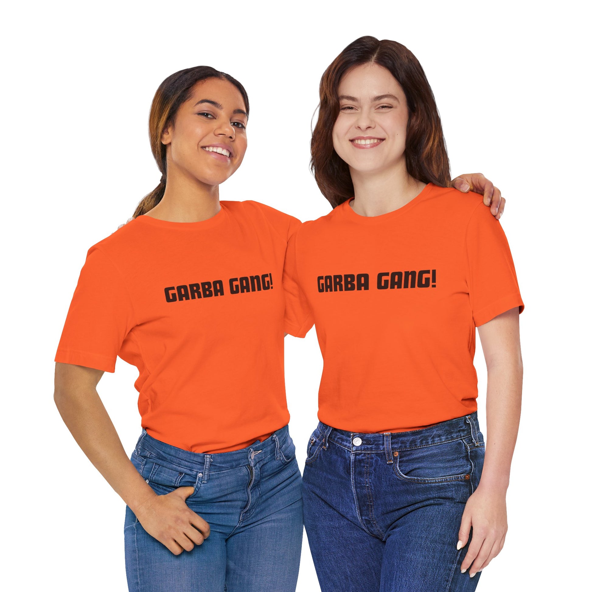 a duo of women wearing a orange shirt that says garba gang