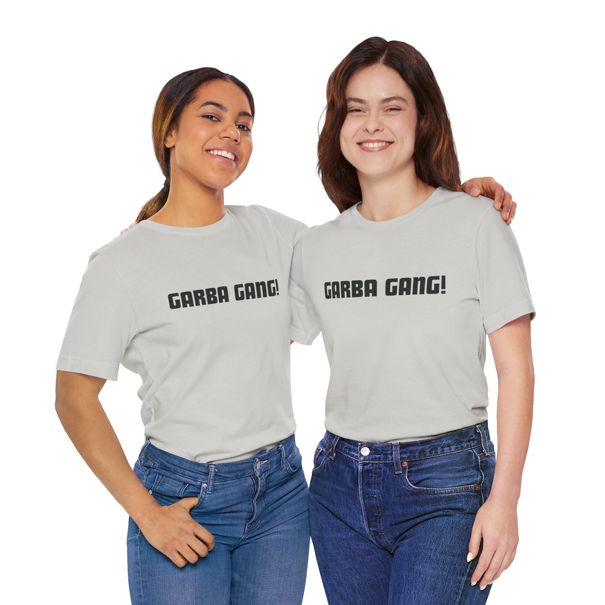 a duo of women wearing a silver shirt that says garba gang