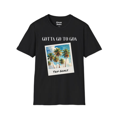 a black shirt that says gotta go to goa with a graphic of goa beach as a postcard that says trip goals