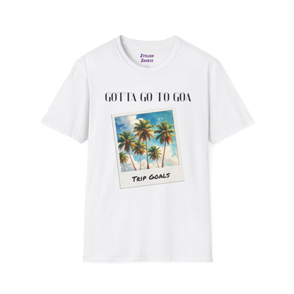 a white shirt that says gotta go to goa with a graphic of goa beach as a postcard that says trip goals