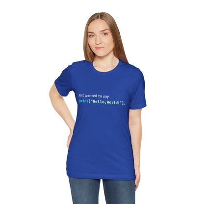 a woman wearing a true royal blue shirt that says just wanted to say with hello world written in programming language