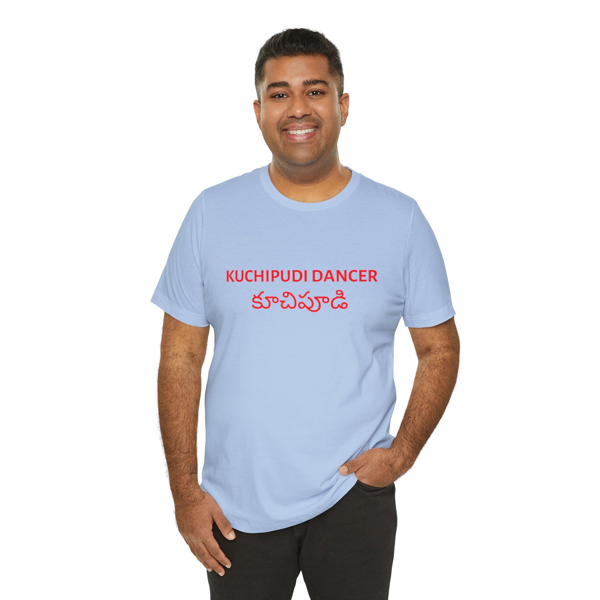 a man wearing a baby blue shirt that says kuchipudi dancer with kuchipudi also written in Telugu