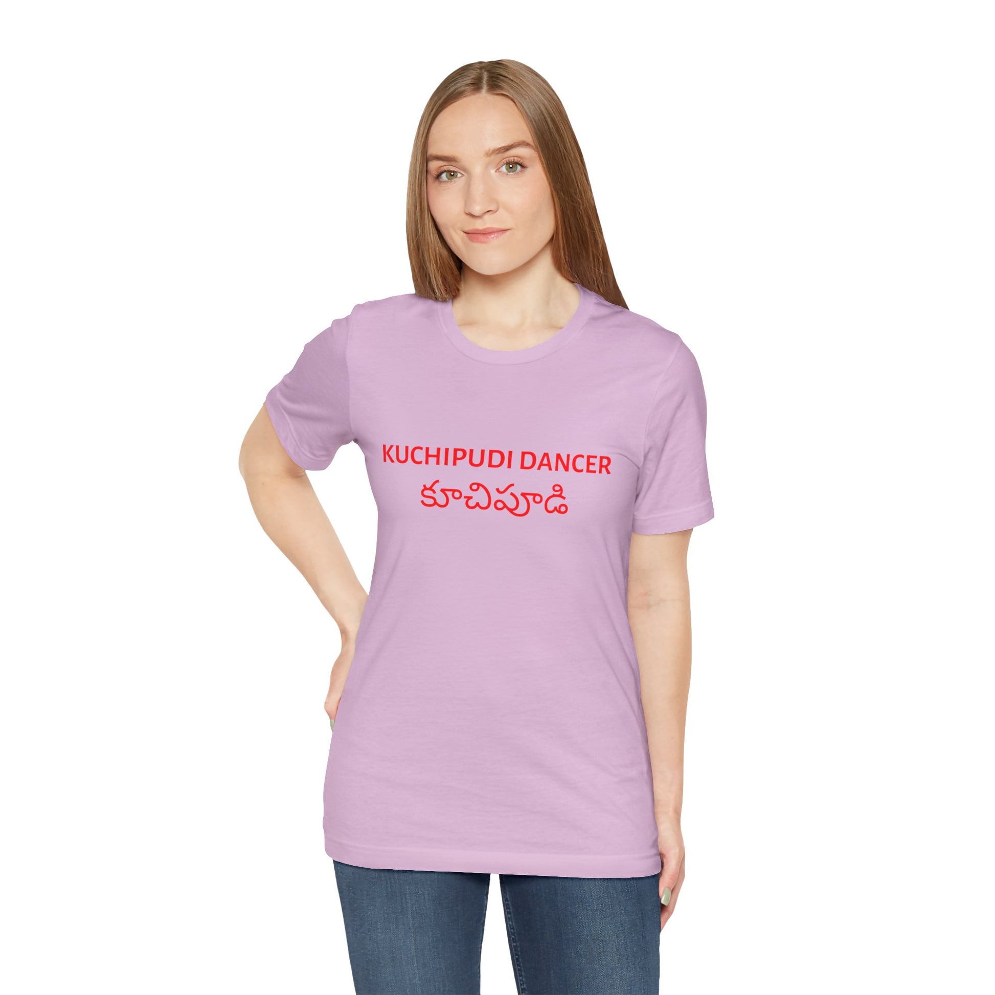 a woman wearing a lilac shirt that says kuchipudi dancer with kuchipudi also written in Telugu