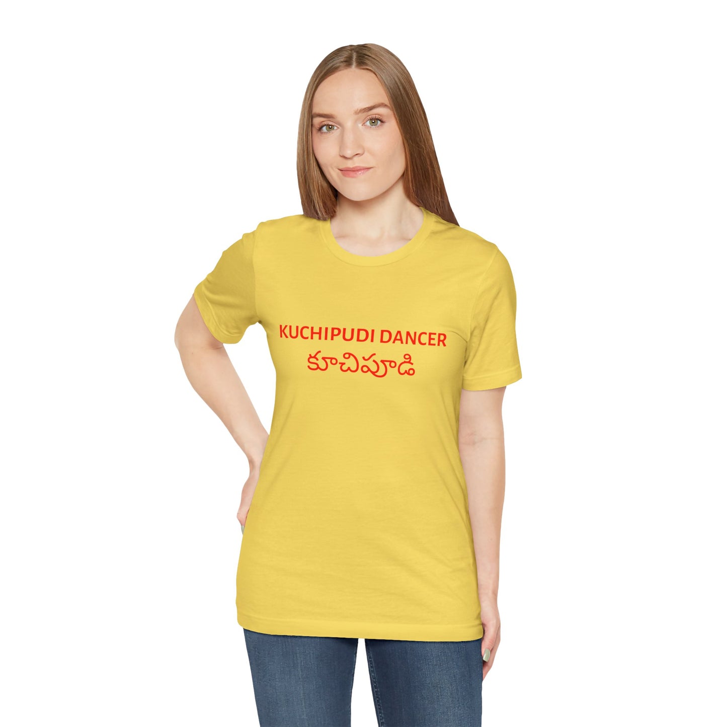a woman wearing a maize yellow shirt that says kuchipudi dancer with kuchipudi also written in Telugu