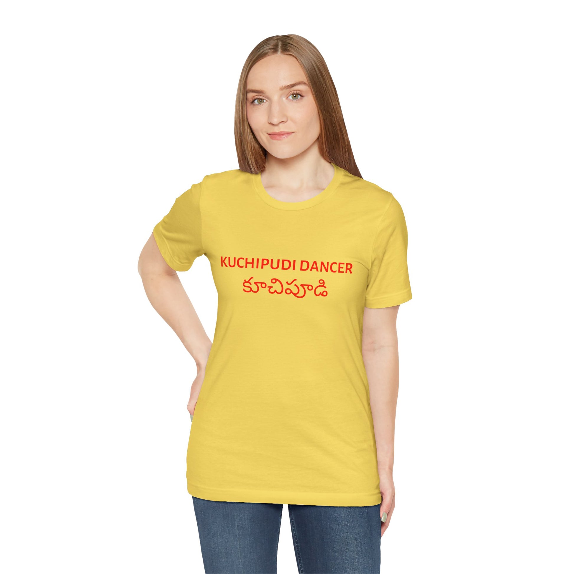 a woman wearing a maize yellow shirt that says kuchipudi dancer with kuchipudi also written in Telugu