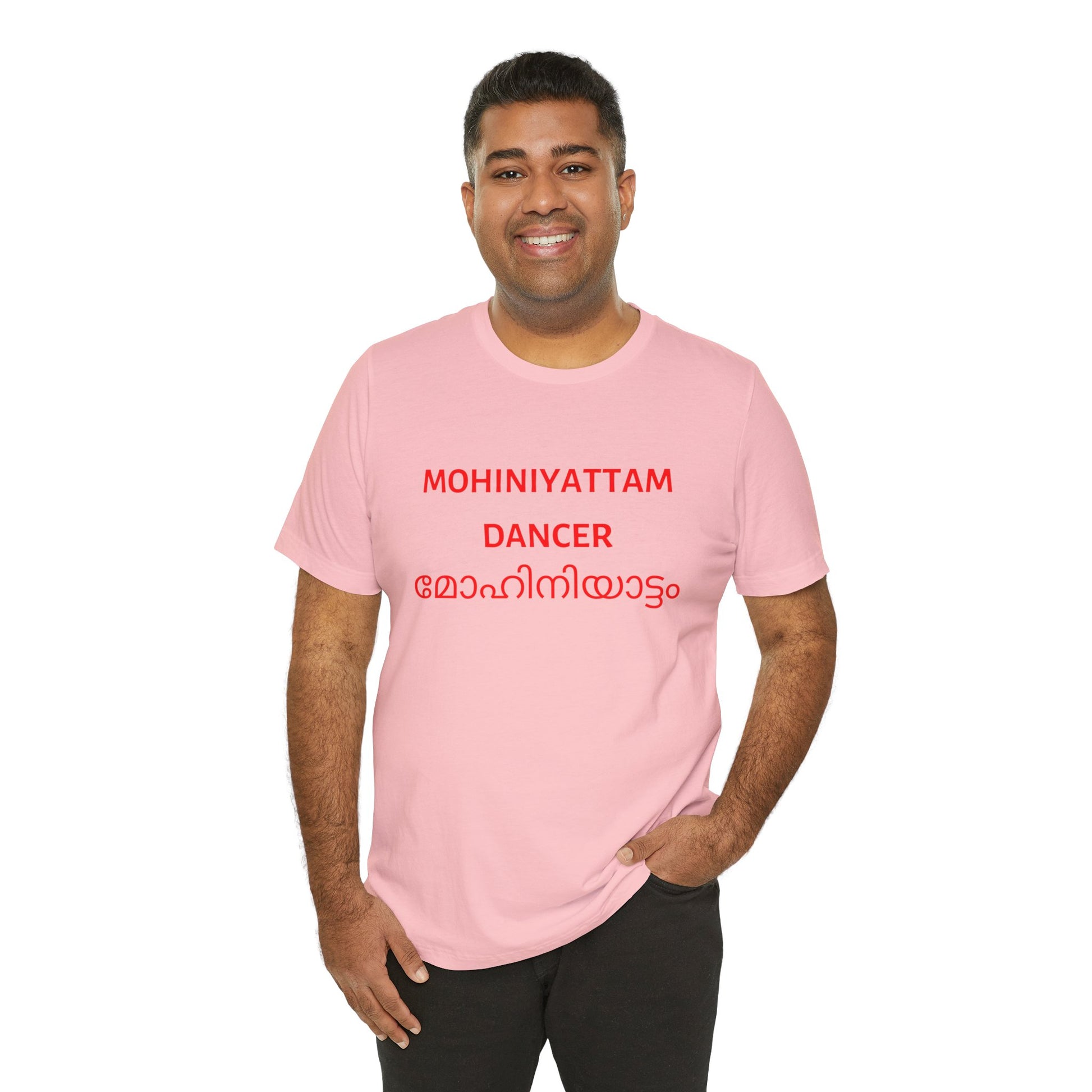 a man wearing a pink shirt that says Mohiniyattam dancer with Mohiniyattam also written in Malayalam