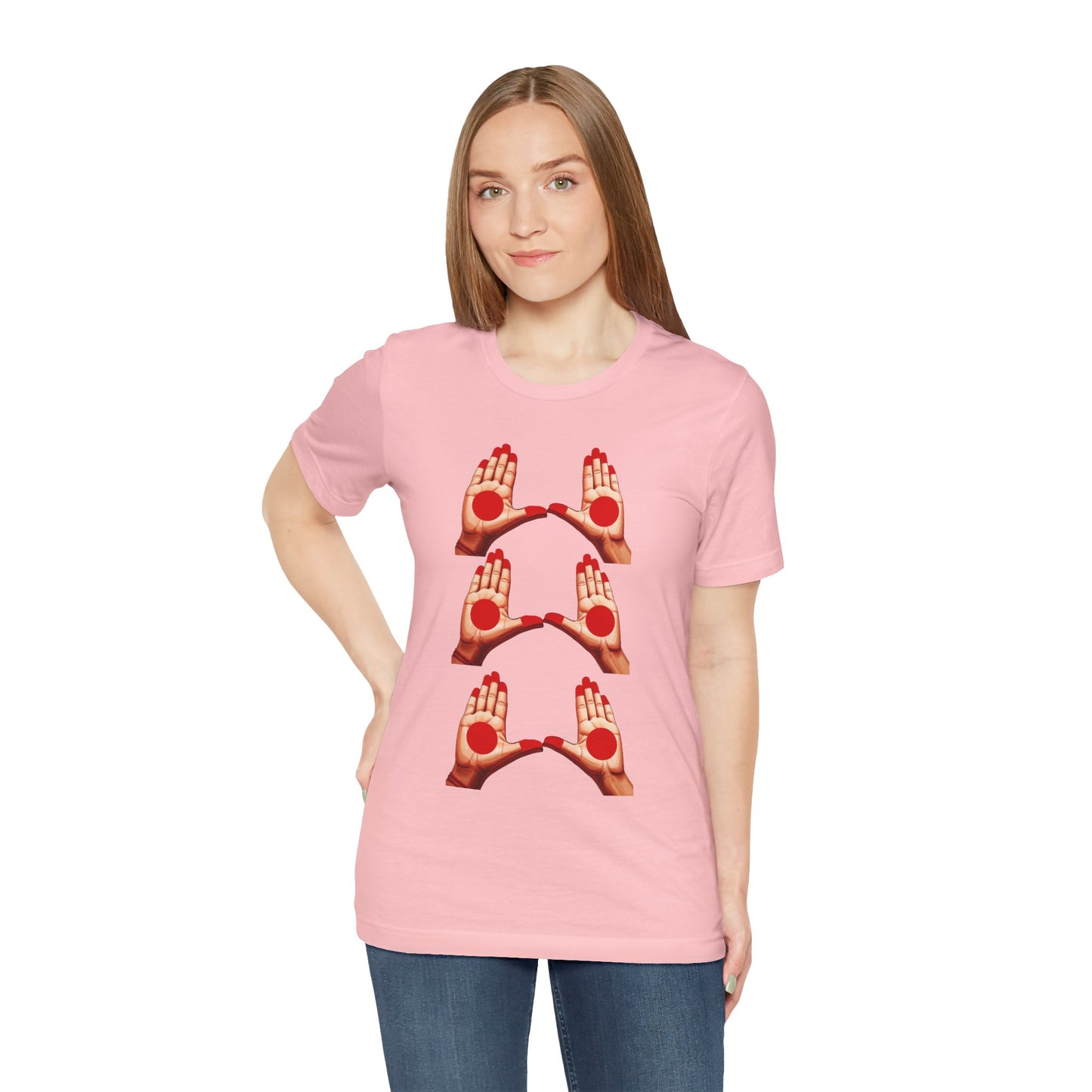 a woman wearing a pink shirt that shows mudras