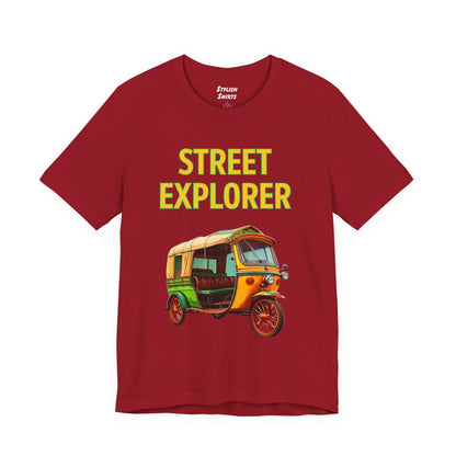 a canvas red shirt that says street explorer with a graphic of an auto rickshaw